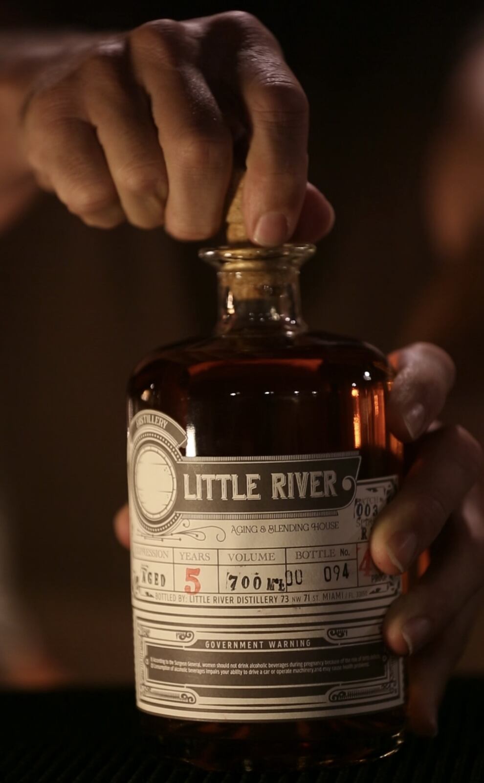 Close-up of a Little River aged rum bottle from the five-rum collection